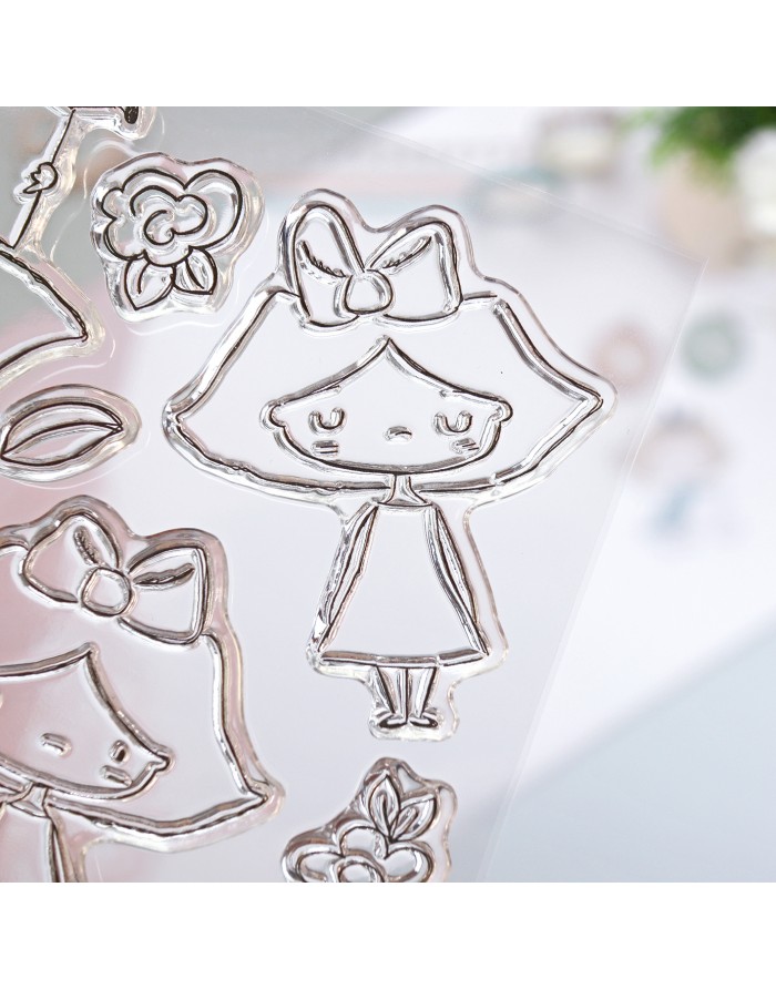 Carimbos transparentes de silicone com desenhos infantis e flores.