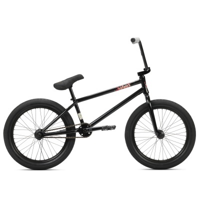 Bicicleta BMX preta com quadro metálico e pneus grossos.