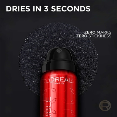 Frasco spray L'Oréal Paris vermelho com tampa preta e texto promocional em fundo preto