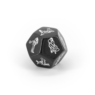 Dado preto com desenhos de figuras humanas em branco