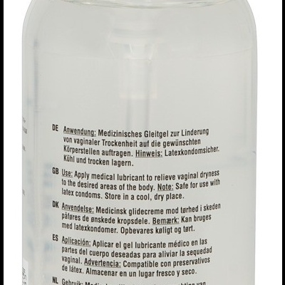 Frasco transparente com tampa doseadora branca de lubrificante médico com rótulo multilíngue