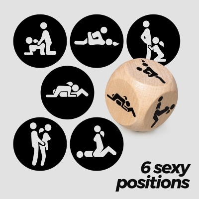 Dado de madeira com ícones de posições sexuais e texto '6 sexy positions'