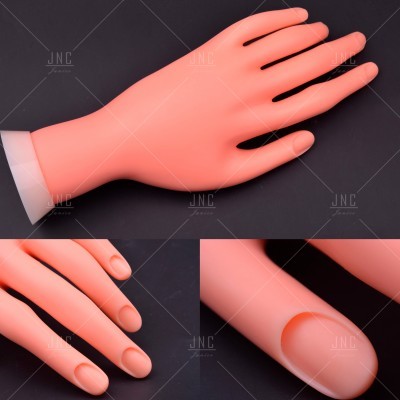 Mão de silicone cor de pele em fundo preto, vista em três ângulos