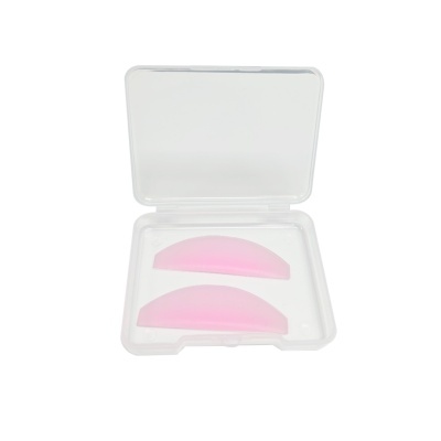 Estojo transparente com duas peças semi-circulares cor de rosa