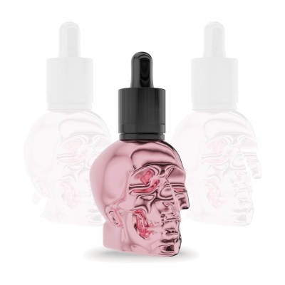 Frasco de vidro rosa metálico em forma de caveira com conta-gotas preto