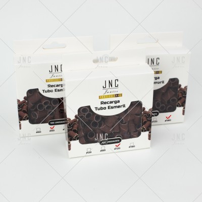 Embalagens brancas com recargas de tubo esmeril castanhas escuras JNC