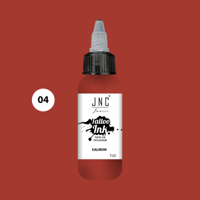 Frasco de tinta para tatuagem com etiqueta branca e tampa preta em fundo salmon.