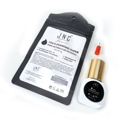 Cola para extensões de pestanas JNC Diamond Super com embalagem preta e frasco branco com tampa dourada