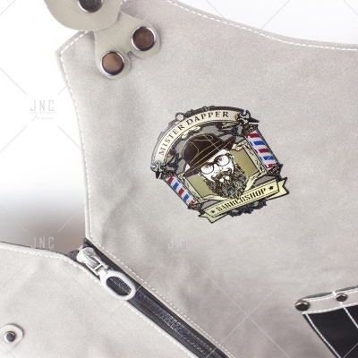 Mochila cinzenta clara com fecho e estampa colorida Mister Dapper Barbershop