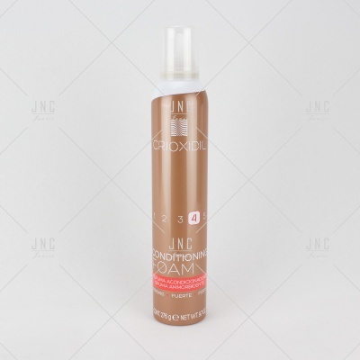 Espuma condicionadora de cabelo castanha com tampa transparente e texto branco e rosa