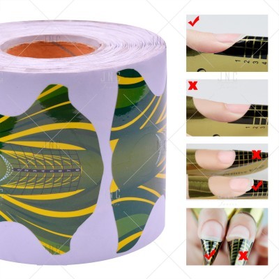 Rolo de moldes para unhas verdes e amarelos com instruções de uso
