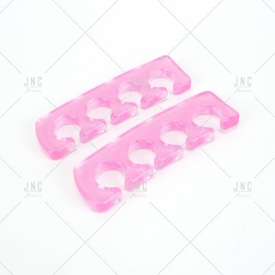 Separadores de dedos cor-de-rosa translúcidos em plástico para pedicure