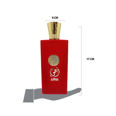 Frasco de perfume vermelho com tampa dourada e texto AJWAA