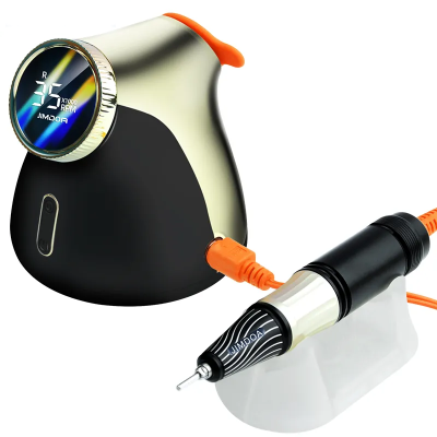 Aparelho elétrico dourado e preto com mostrador digital e caneta preta e prateada com cabo laranja