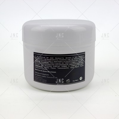 Frasco plástico branco com tampa e etiqueta preta com texto em português