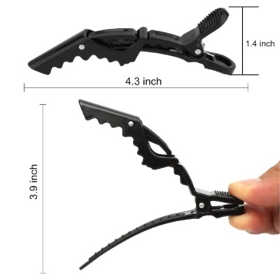 Clip de cabelo preto em plástico com dentes, medindo 4.3 polegadas