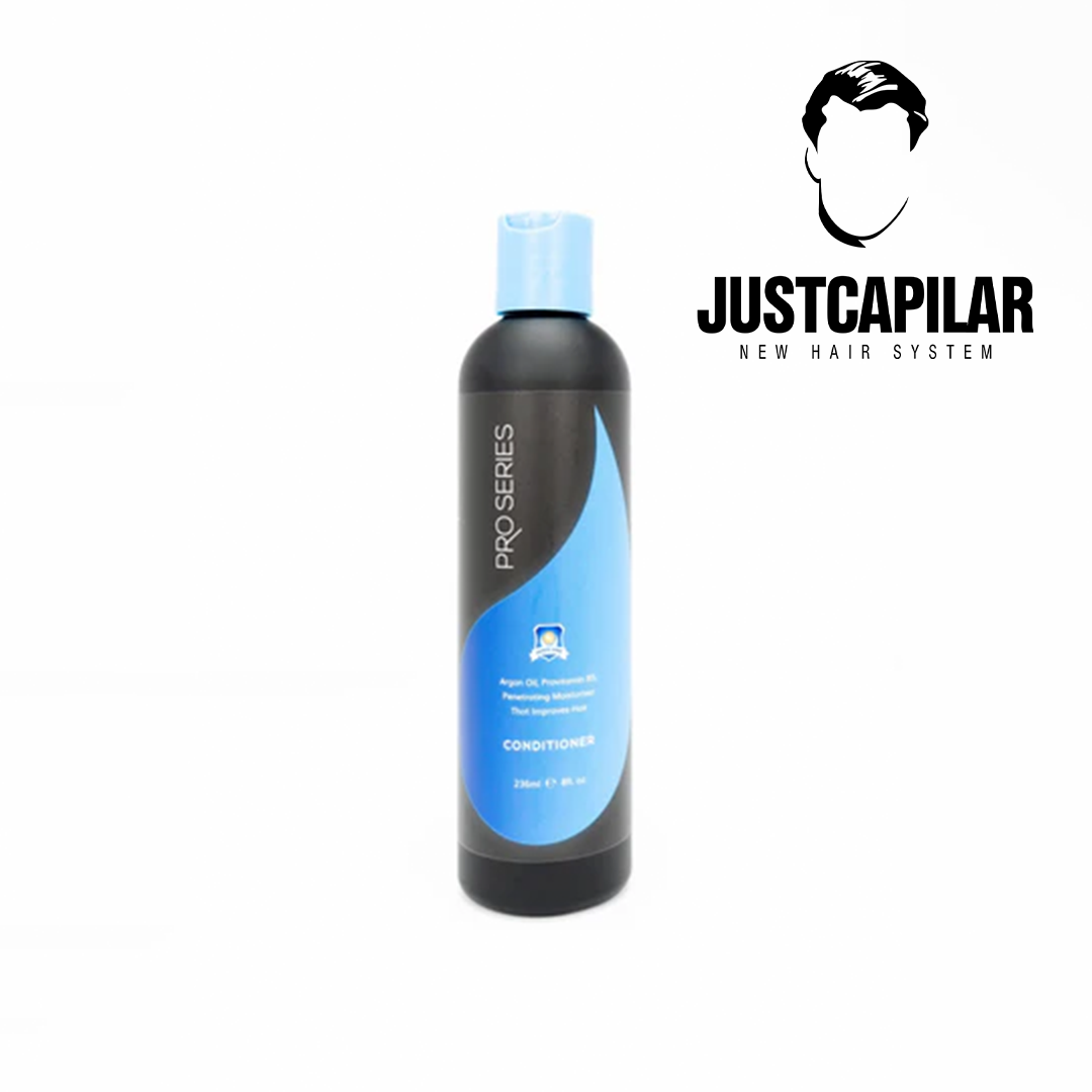 Condicionador Pro Series - Uso Diário para Perucas, Apliques e Sistemas Capilares - 8oz (236ml) Frasco preto de condicionador com rótulo azul e texto em inglês.
