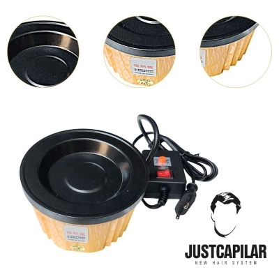 Base aquecedora preta e amarela para capacete de alisamento com cabo elétrico.