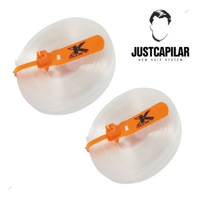 Acessórios capilares transparentes com presilhas laranja e texto JUSTCAPILAR