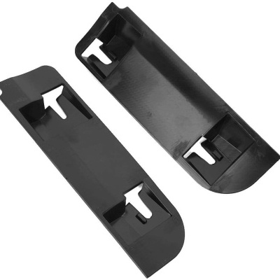 Dois painéis plásticos pretos com recortes e encaixes