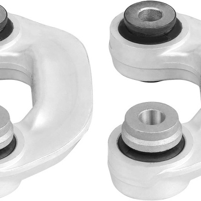 Par de peças metálicas curvas prateadas com elementos cilíndricos pretos e cinzentos