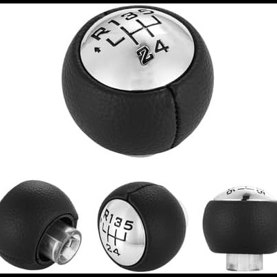 Manete de velocidades de carro em couro preto com topo metálico prateado e números gravados