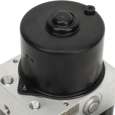 Componente mecânico metálico com tampa preta cilíndrica