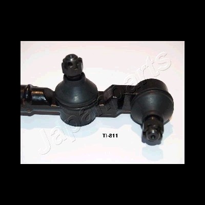 Peça automóvel metálica preta com código TI-811