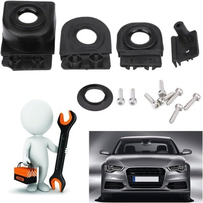 Peças de borracha preta, parafusos, carro cinzento e figura humana com chave inglesa.