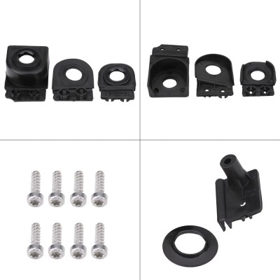 Conjunto de suportes plásticos pretos e parafusos metálicos prateados em fundo branco