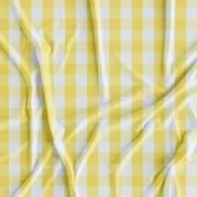 Tecido xadrez amarelo e branco com vincos