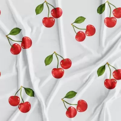 tecido branco com estampa de pares de cerejas vermelhas e folhas verdes