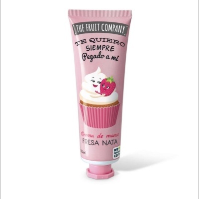 Tubo cor-de-rosa de creme de mãos com ilustração de cupcake e morango.