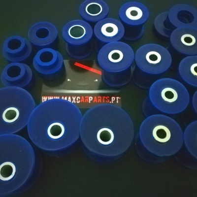 Vários rolos azuis com centro branco dispostos sobre superfície preta com texto MAXCARPARTS.PT