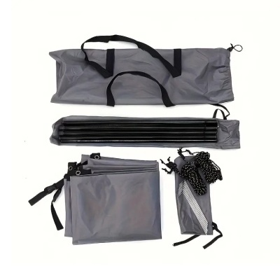 Conjunto de acessórios para tenda cinzenta e preta sobre fundo branco