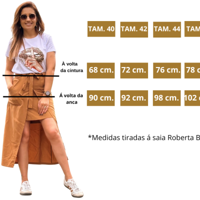 Mulher com saia castanha e t-shirt branca com tabela de tamanhos e medidas em cm