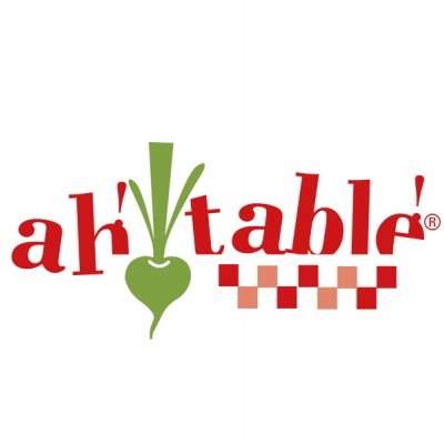 Logótipo ah'table! com rábano verde e padrão de quadrados vermelhos