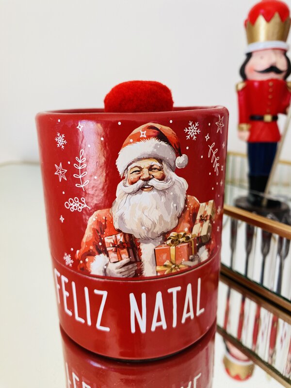 Vela alusiva ao Natal de frutos vermelhos
