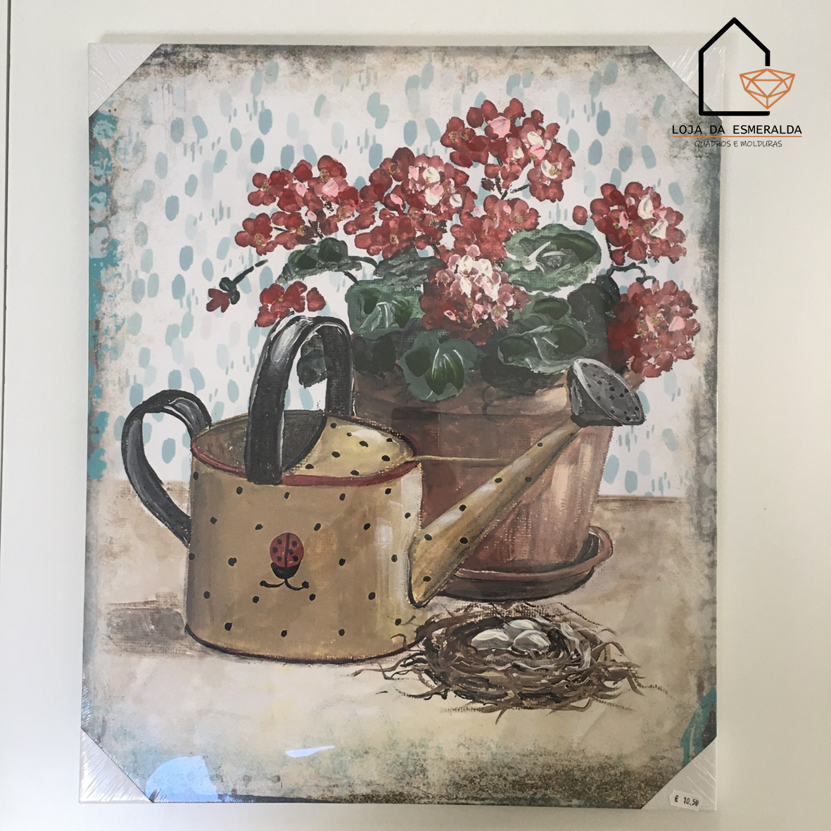 Quadro decorativo com regadora, vaso de flores e ninho de pássaro
