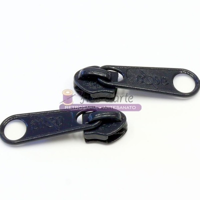 Dois cursor de fecho éclair pretos metálicos com orifícios