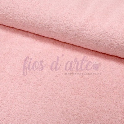 Pano de tecido felpudo rosa claro dobrado