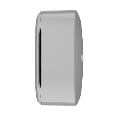 Dispositivo eletrônico cinza prateado visto de lado numa cavidade