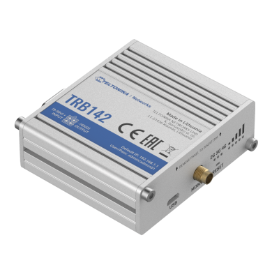 Dispositivo eletrónico TRB142 metálico cinza com etiquetas azuis e portas USB