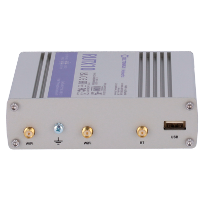 dispositivo eletrónico cinzento com conectores WiFi, BT e USB