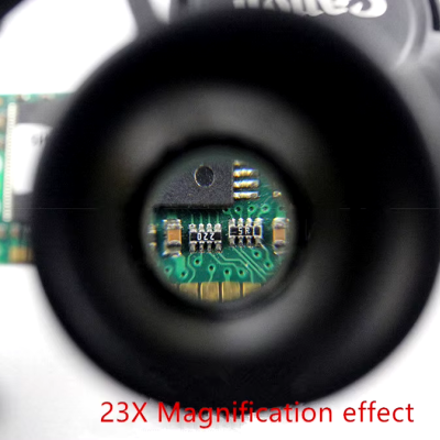 Circuito eletrónico verde visto por lente com efeito de ampliação 23X