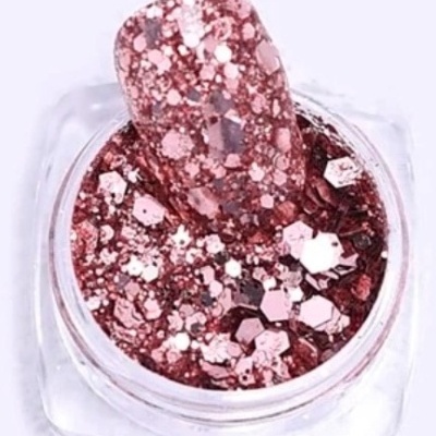 Verniz glitter rosa metalizado com partículas diversas