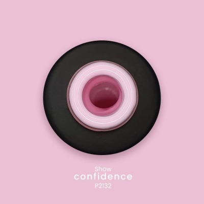 anel preto com interior rosa em fundo rosa claro com texto Show confidence P2132