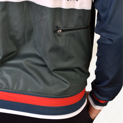 Casaco desportivo colorido com fecho de correr e manga comprida azul