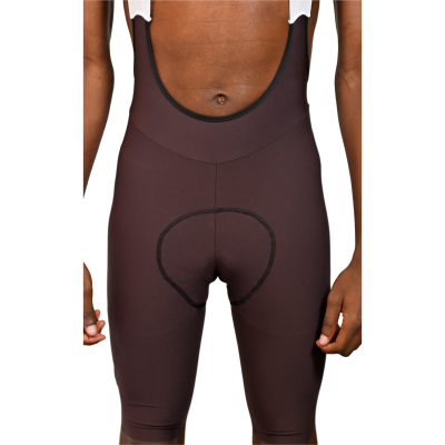 Calções de ciclismo com alças pretos e acolchoamento no assento.