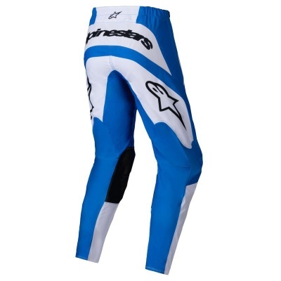 Calças de desporto motorizado azul, branco e preto com logótipo Alpinestars.